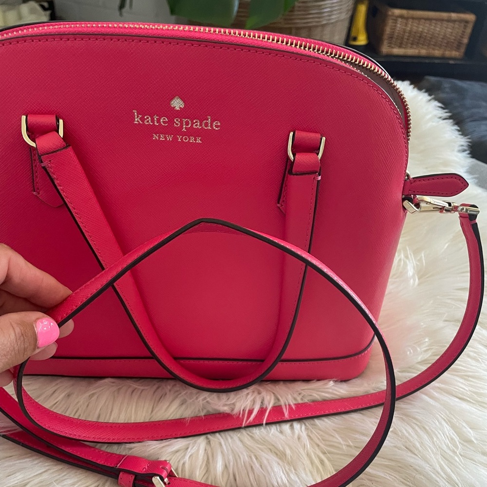 Festive pink Kate Spade crossbody or handbag